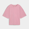 Puma Womens Her Oversized Tee Pink featuring a ribbed crew neck in soft pink color and relaxed fit.