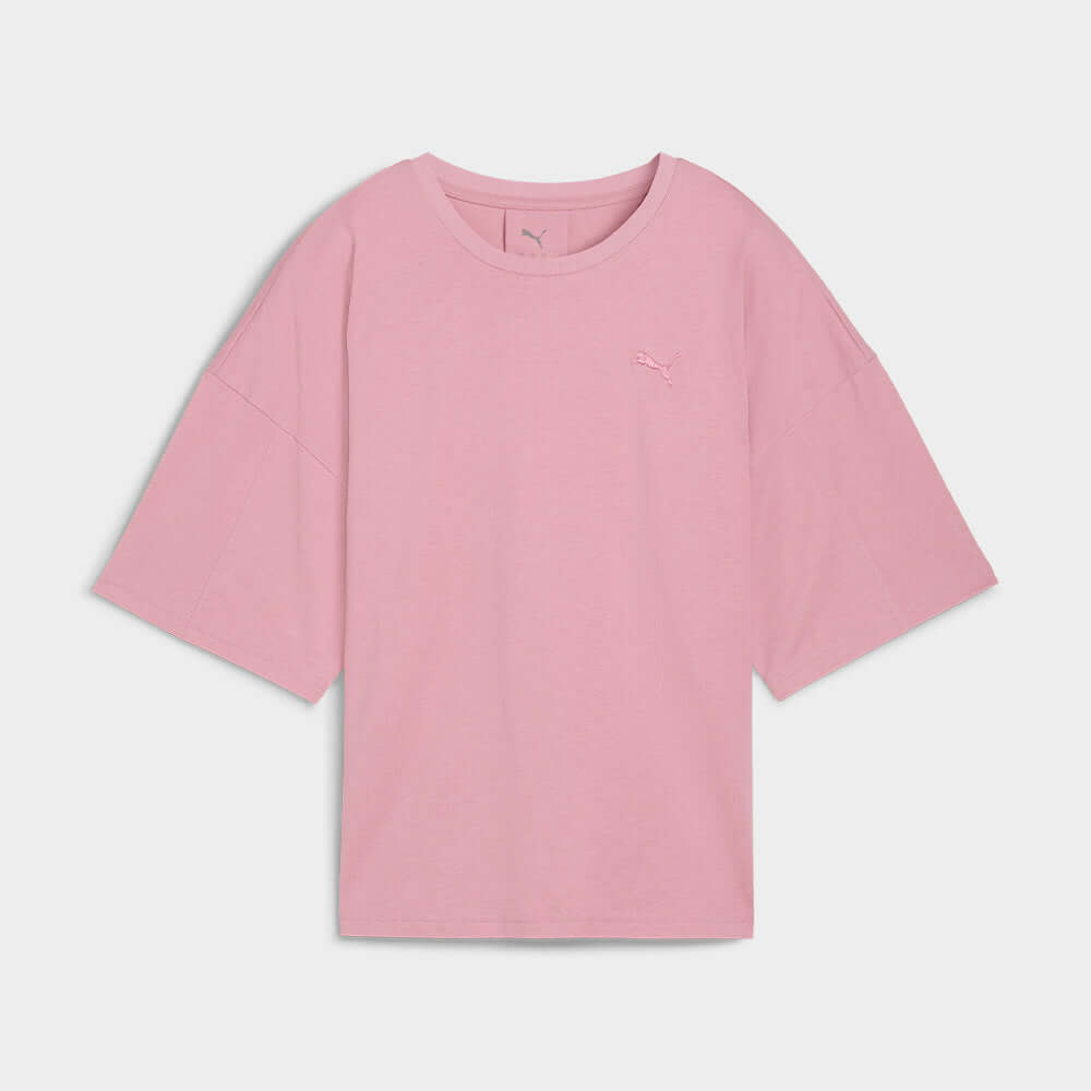Puma Womens Her Oversized Tee Pink featuring a ribbed crew neck in soft pink color and relaxed fit.
