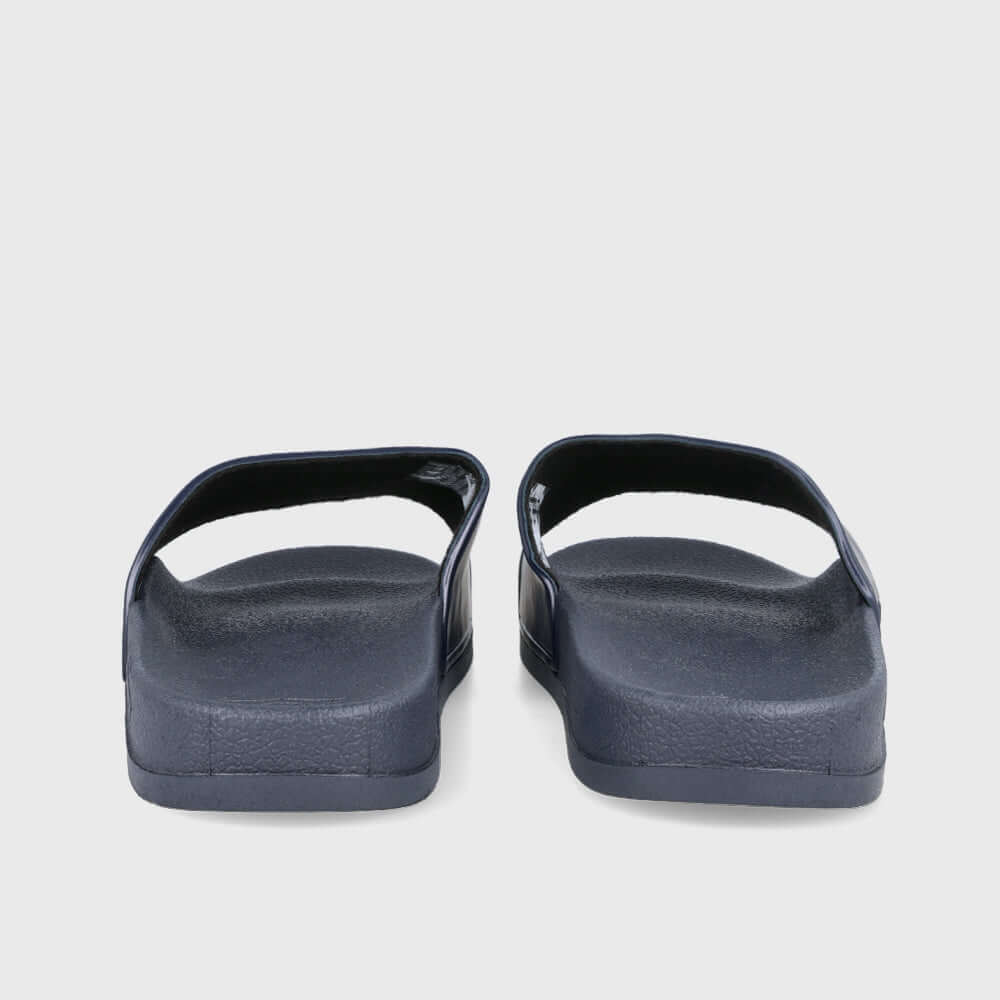 Rear view of Umbro Unisex Sport Slides in Navy, showcasing the slip-on design and cushioned footbed.